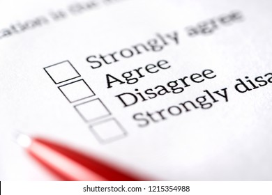 Opinion Poll, Survey And Questionnaire Concept. Filling Multiple Choice Question Form With Paper And Pen. Agree Or Disagree Check Box. Politics Or Human Resources Research, Feedback Or Experience.