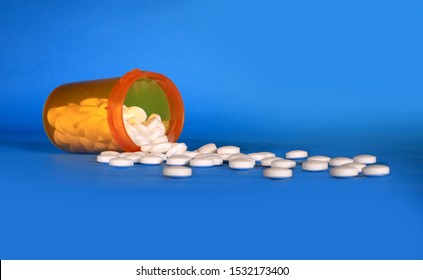 Opioid Crisis - Open Bottle Of Prescription Painkillers. Chemist, Doctor.