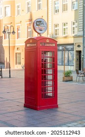 Opole, Poland - June 4, 2021: Internet Hot Spot Looking Like Red British Telephone Box.