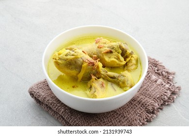 Opor Ayam, Indonesian traditional  food. Opor made from chicken cooked with coconut milk and spices. Its served to celebrate Eid Adha and Eid Fitr. 
 - Shutterstock ID 2131939743
