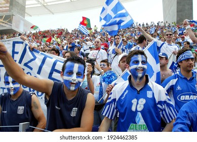 Oporto, PORTUGAL - June12, 2004: 
Greek Fans Cheer On Their Team
During The UEFA Euro 2004 - 
Portugal V Grece At Estádio Do Dragão. 
