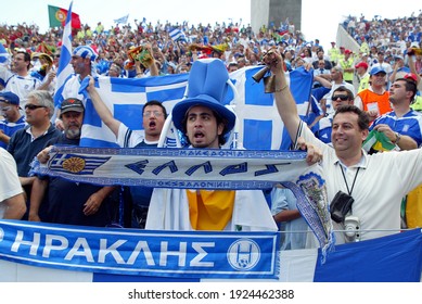 Oporto, PORTUGAL - June12, 2004: 
Greek Fans Cheer On Their Team
During The UEFA Euro 2004 - 
Portugal V Grece At Estádio Do Dragão. 
