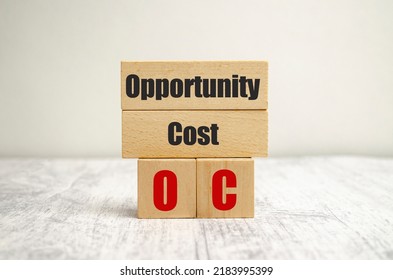 Opportunity Cost Words On Wooden Blocks And White Background