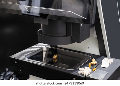 Optic machine for precise measurement of part size and quality evaluation. Smart factory	