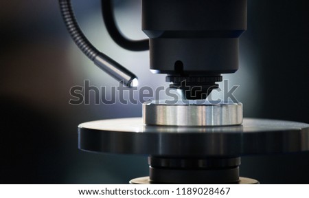 Optic machine for precise measurement of part size and quality evaluation. Smart factory.