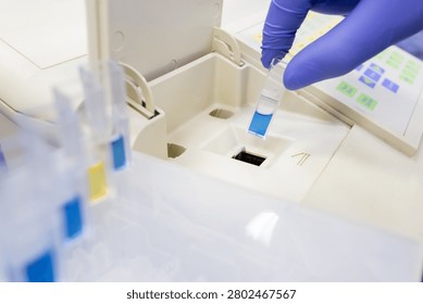 Optical analysis of substances using a spectrophotometer in a laboratory. Determination of optical density.