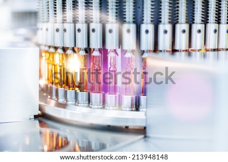 Optical control quality of a vials, pharmaceutical factory.Flare light