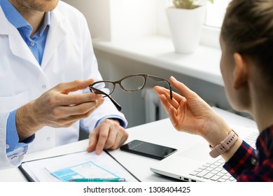 Optician Gives New Glasses To A Patient