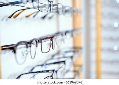 in optician shop- glasses for sale in wall rack