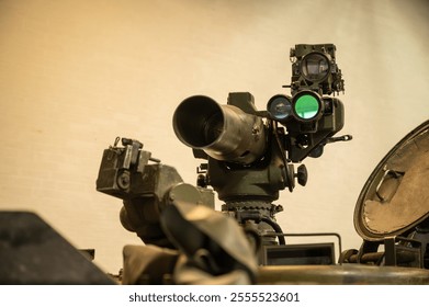 Optics and aiming device of a weapon system on a military tracked vehicle 
