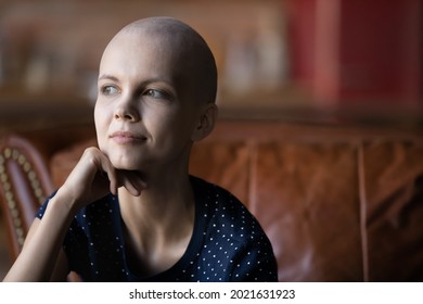 Optimistic Cancer Patient Thinking Of Treatment Recovery, Remission After Successful Chemotherapy. Young Woman Fighting Against Oncology Disease. Leukemia Survivor, Breast Cancer Fighter Portrait