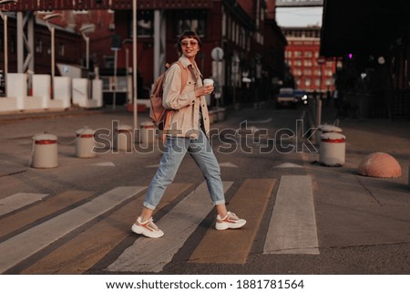 Similar – Image, Stock Photo beautiful caucasian woman walking with her cute brown poodle on the road. Pets and lifestyle outdoors