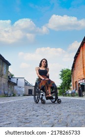 Optimistic young woman with paraplegia smiling. Hope concept. - Shutterstock ID 2178265733
