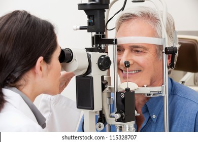 Optometrist Performing Visual Field Test