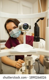 Optometrist Slit Lamp, Ophtalmology Diopters Calibration In Oculist Lab Of Young Woman Doctor.