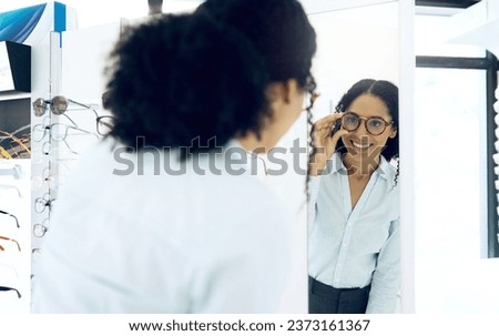 Optometry store, mirror or happy woman with glasses, lens frame or retail decision for eyewear, vision or ocular support. Reflection, eyewear option or shop client, customer and choice for eyeglasses