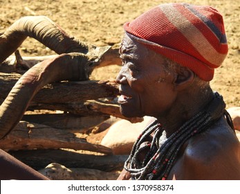 Opuwa, Kunene Region, Namibia, May 10, 2017: Himba village, Himba people carrying a colourful necklace near epupa falls. - Shutterstock ID 1370958374