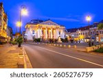 Oradea, Romania: Night view of Oradea State Theater, a historical building that houses Regina Maria Theater and the Szigligeti Theater, Crisana, Transylvania