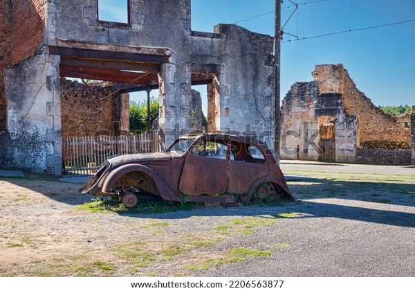 Oradour-Sur-Glane,\
France,12-sept-2022:the remains of the doctor\'s car in Oradour sur\
Glane the village in France where over 600 men women and children\
were killed by the Nazis in June\
1944