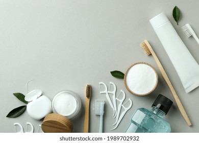 Oral Care Accessories On Gray Background, Space For Text