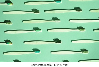 Oral Care Background. Many Toothbrush. Zero Waste Pattern. Ecological Wood Brush. Dentist Hygiene. Medicine Home Objects. Recycle Dental Concept. Repeat. Top View Texture. Green Color