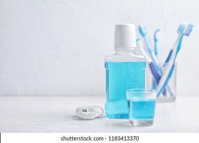 Oral Care Products And Space For Text On Light Background. Teeth Hygiene