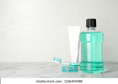 Oral Care Products And Space For Text On Light Background. Teeth Hygiene