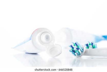 Oral hygiene accessory isolated on white background, toothpaste, toothbrush head