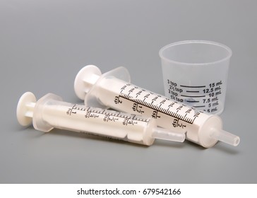 Oral Medicine Syringes And Dosing Cup