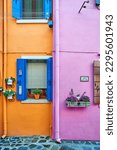 An oranage house and a pink house in Burano Venice