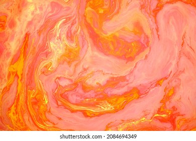 Orange abstract marble background, stains of red and yellow paint on the surface of the water. Liquid colorful backdrop. - Shutterstock ID 2084694349