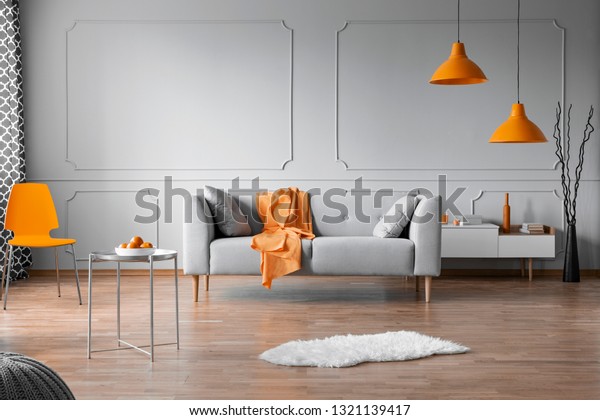 Orange Accents Grey Living Room Interior Royalty Free Stock Image