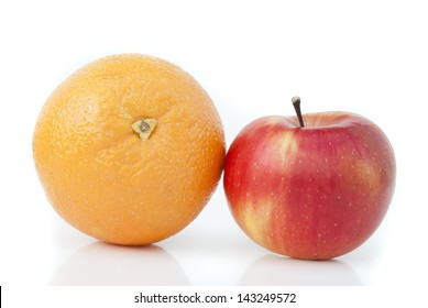 Orange and apple on a white background.