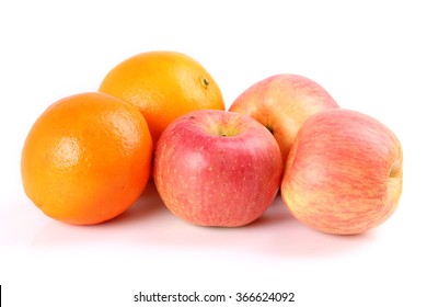 Orange and apple on a white background.