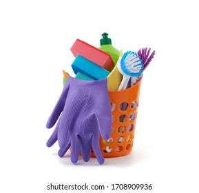 orange basket with washing sponges, rubber protective gloves, brushes and cleaning agent in a green plastic bottle, set isolated on a white background - Powered by Shutterstock