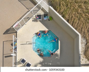 Orange Beach, Alabama / USA - February 15 2018: Hot Tub From Above With People Relaxing And Visiting