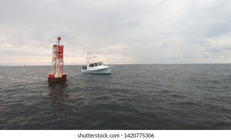 Orange Beach, Alabama/USA - June 5,2019 Deep Sea Fishing For Red Snapper Around A Buoy In The Gulf Of Mexico.