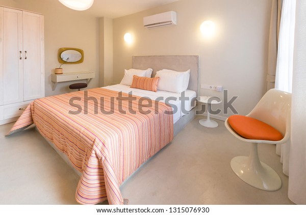 Orange Beige Colored Master Bedroom Cupboard Stock Photo