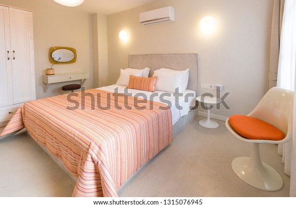 Orange Beige Colored Master Bedroom Cupboard Stock Photo