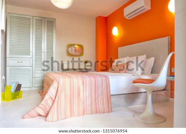 Orange Beige Colored Master Bedroom Cupboard Stock Photo