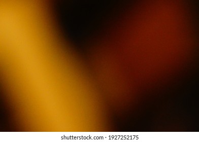 Orange And Black Smudged Abstract Background. Honey-colored