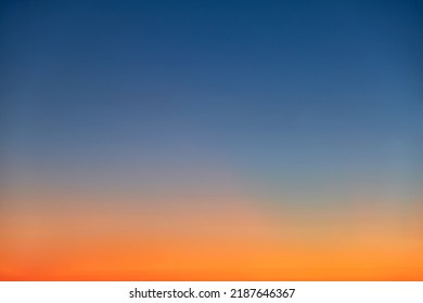 Orange And Blue Sunset Sky Gradient, Copy Space Background. Red Evening Sky Without Clouds