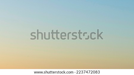 Orange and blue sunset sky gradient background. Sunset background afternoon on the beach blue and yellow degrade clean sky. Clean Sky. Summer. Summer Background. Beach Background. The morning sky 