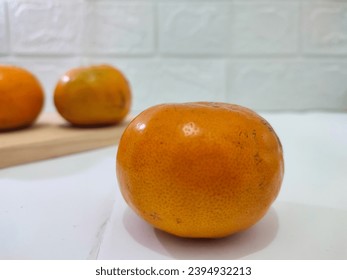 Orange with blurred background.  Negative space. - Shutterstock ID 2394932213