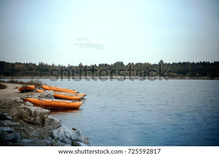 Orange Boats on the lake
