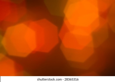 orange bokeh light background in hexagon shape