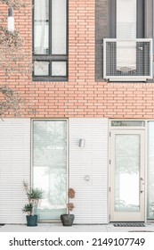 Orange Brick City Apartment Entrance