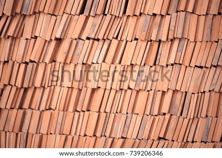 Orange brick walls are arranged in rows.