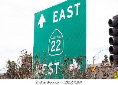 Orange, California/United States - 02/27/19: A Freeway Sign In Orange County Directing Traffic Towards The California 22 Freeway