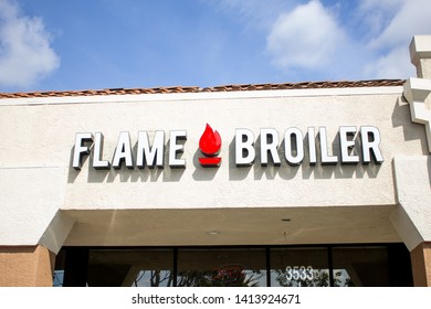 Orange, California/United States - 04/03/2019: A Store Front Sign For The Rice Bowl Restaurant Known As Flame Broiler